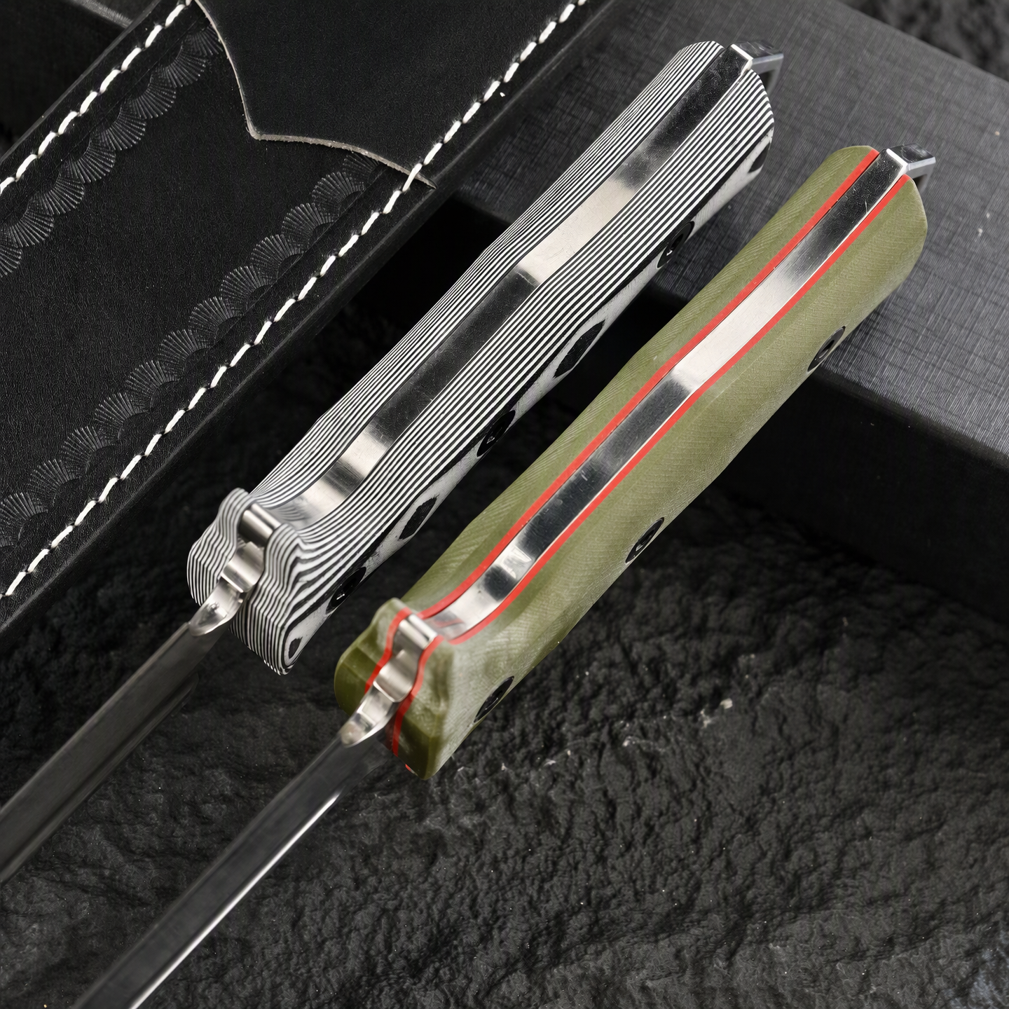 G10 handle butt and full tang spine detail of fixed blade knife